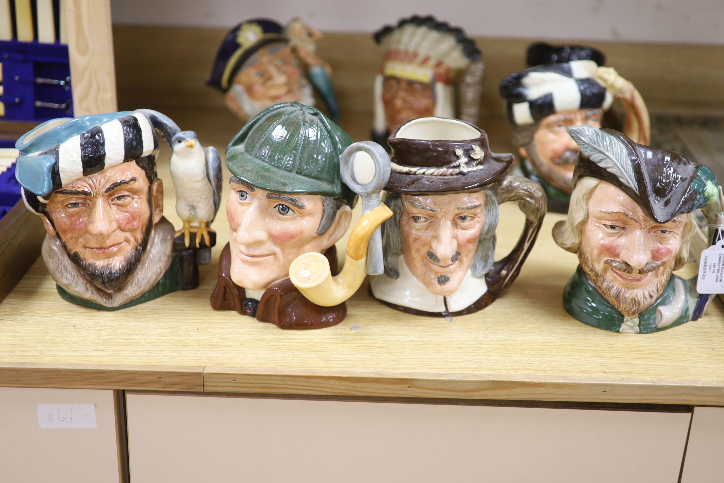 Eleven Doulton character jugs